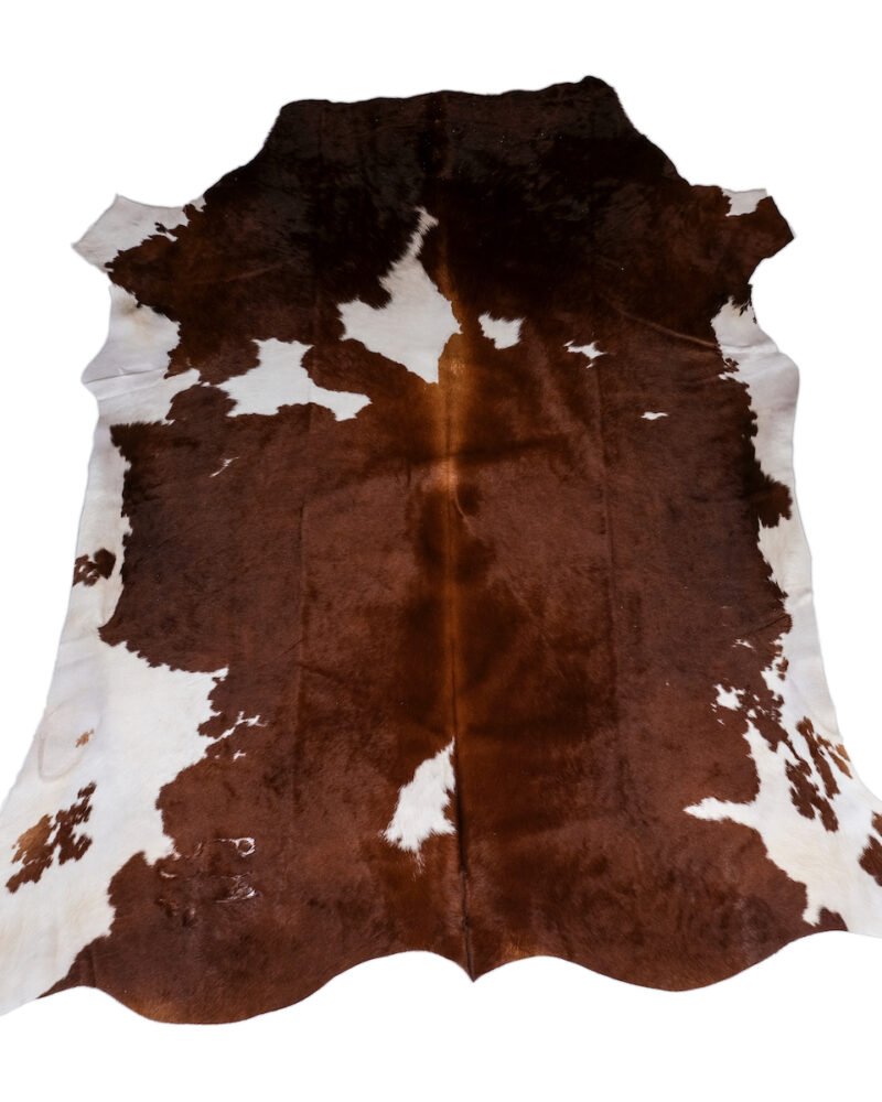 Brown and White Cowhide Rugs - Image 4